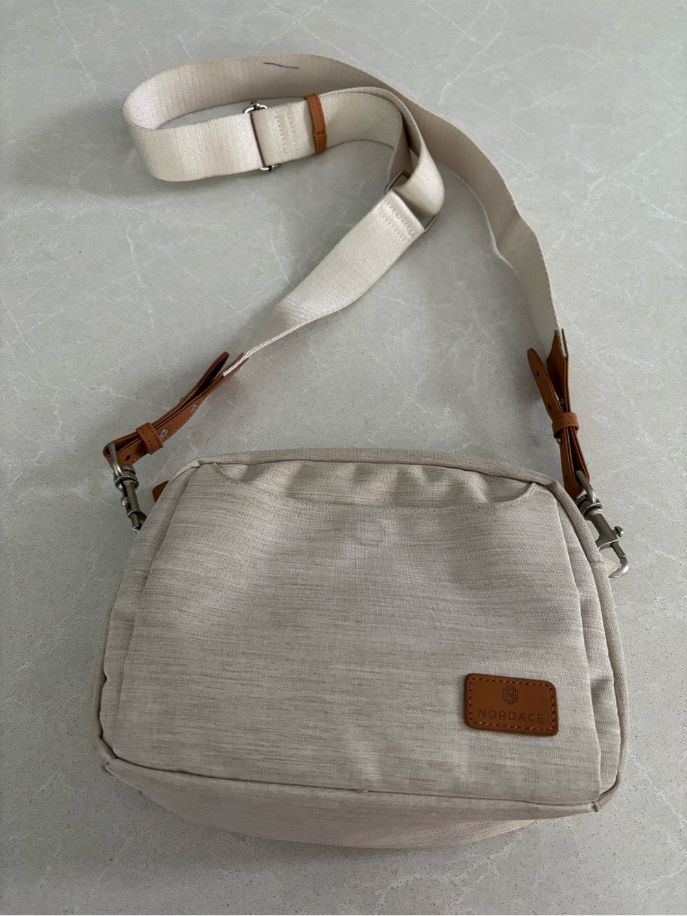 Nordace Siena Pro Smart Travel Crossbody Bag Beige Anti Theft RFID Camera Style